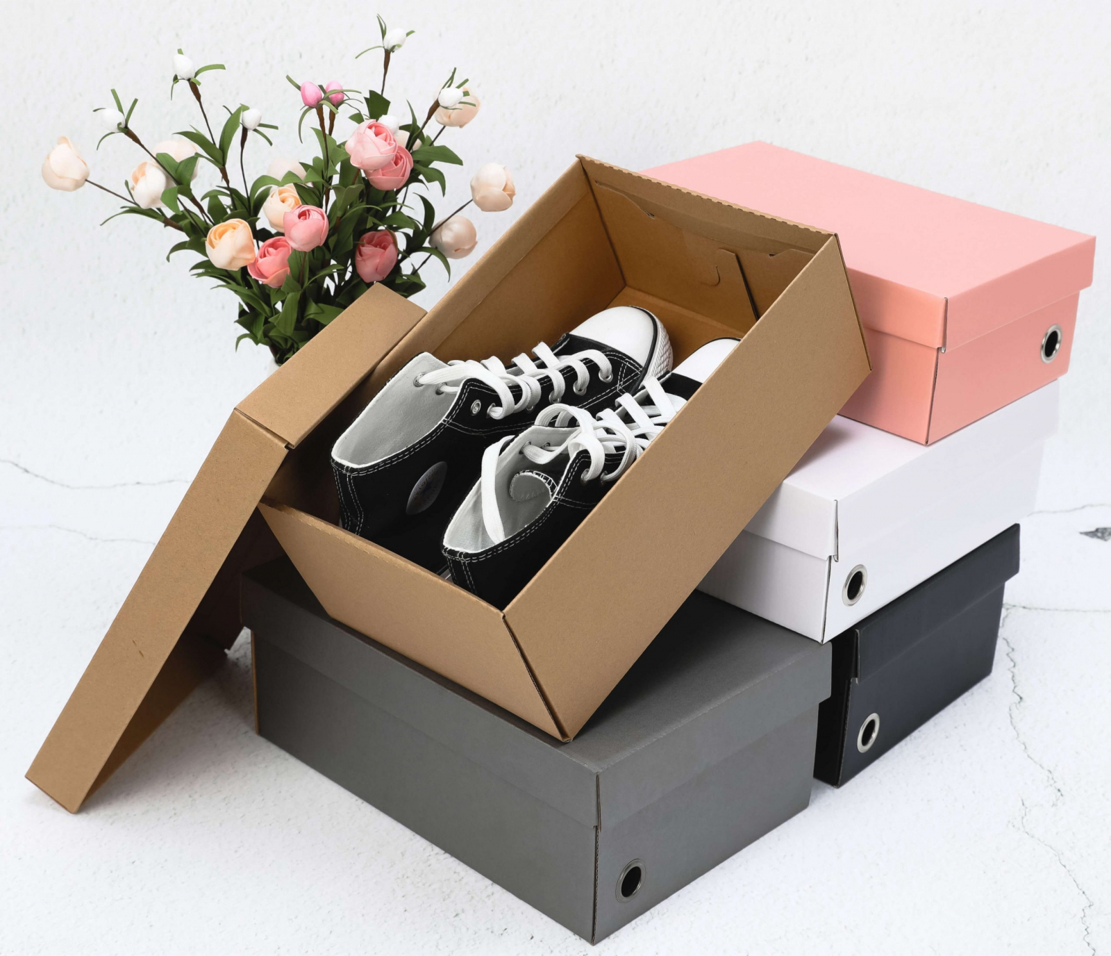 Vì sao nên sử dụng hộp carton để đựng giày?